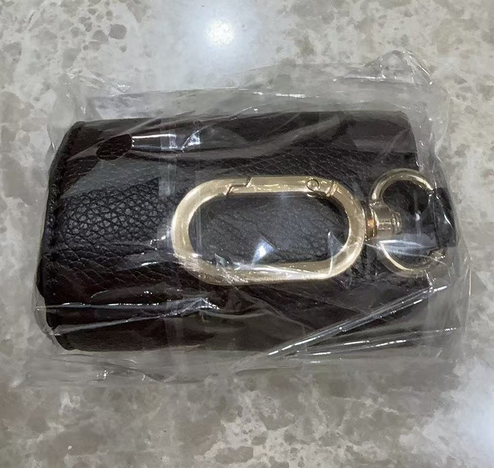 Black folded bag charm with clasp
