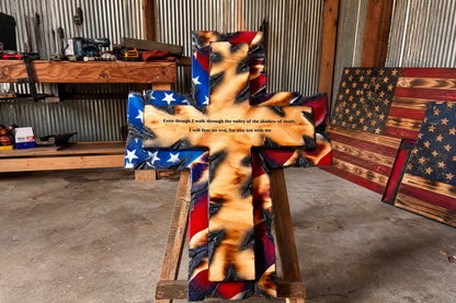 Handmade Tattered Flag Cross on a wooden easel in the workshop
