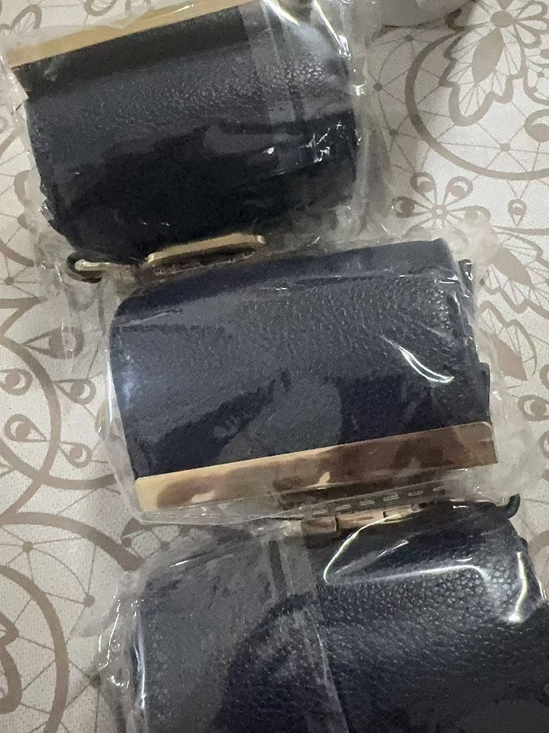 Black and navy folded bag charms